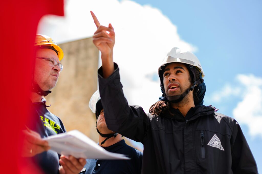 a male engineer pointing